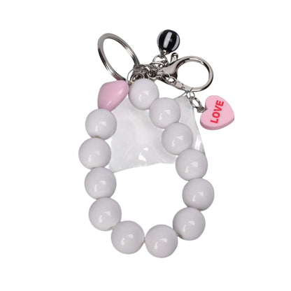 LLAVERO CELULAR PLASTICO DIM:10X7X1