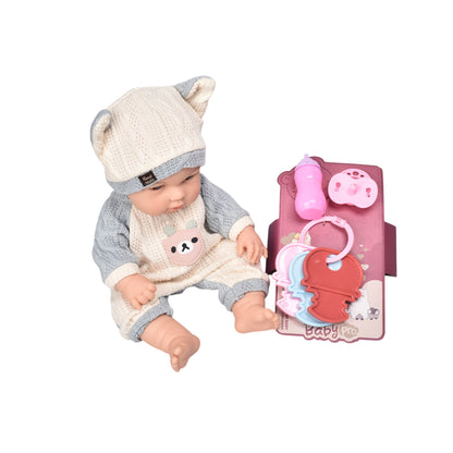 MUÑECA DE CAUCHO REALISTA CON ACCESORIOS DIM:15X9X31CM