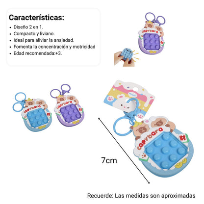 LLAVERO PLASTICO FORMA DE JUEGO AZUL MORADO DIM:7X7X1