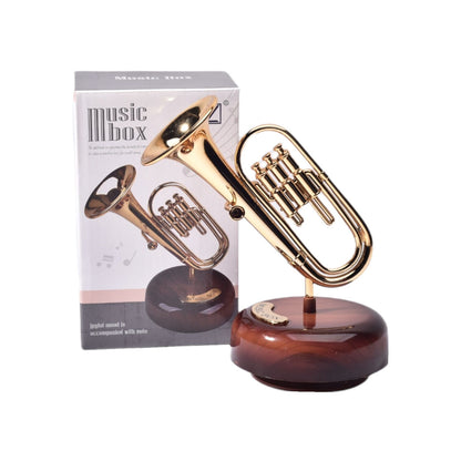 CAJA MUSICAL TROMPETA EN PLASTICO DIM:9.2*13*17CM