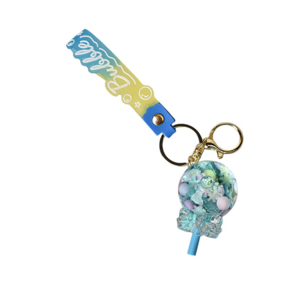 LLAVERO PLASTICO FORMA DE COLOMBINA VARIOS COLORES DIM:3X3X6