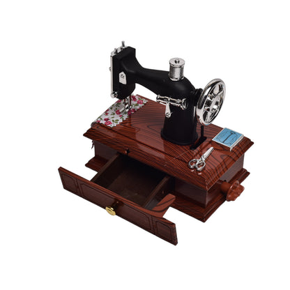 CAJA MUSICAL MAQUINA DE COSER EN PLASTICO 15x13x9