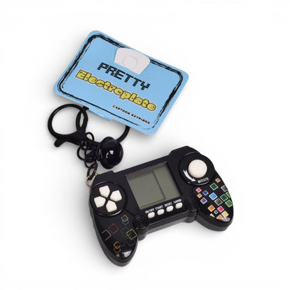 LLAVERO PLASTICO FORMA DE JUEGO DIM: 7X4