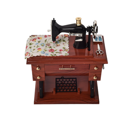CAJA MUSICAL MAQUINA DE COSER EN PLASTICO