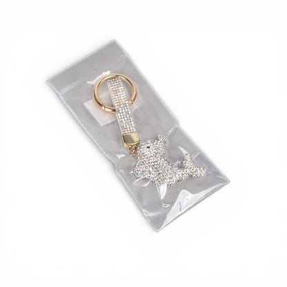 LLAVERO RESINA Y  METAL DELFIN DIM:6X5X1