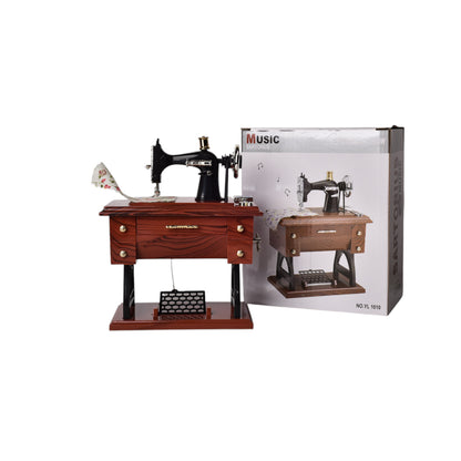 CAJA MUSICAL MAQUINA DE COSER EN PLASTICO DIM:7x15x13CM