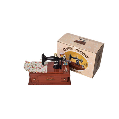 CAJA MUSICAL MAQUINA DE COSER EN PLASTICO DIM:16x9x12CM