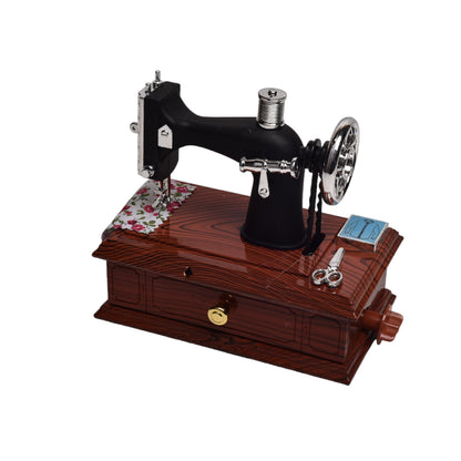 CAJA MUSICAL MAQUINA DE COSER EN PLASTICO 15x13x9