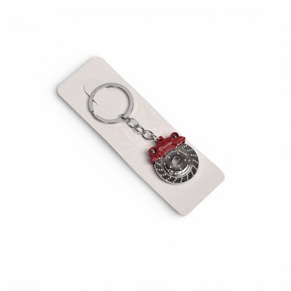 LLAVERO METAL FORMA DE CIERRA DIM:2X2X4