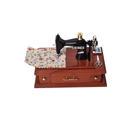 CAJA MUSICAL MAQUINA DE COSER EN PLASTICO DIM:16x9x12CM