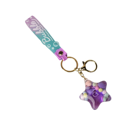 LLAVERO PLASTICO FORMA DE ESTRELLA VARIOS COLORES DIM:6X5X2