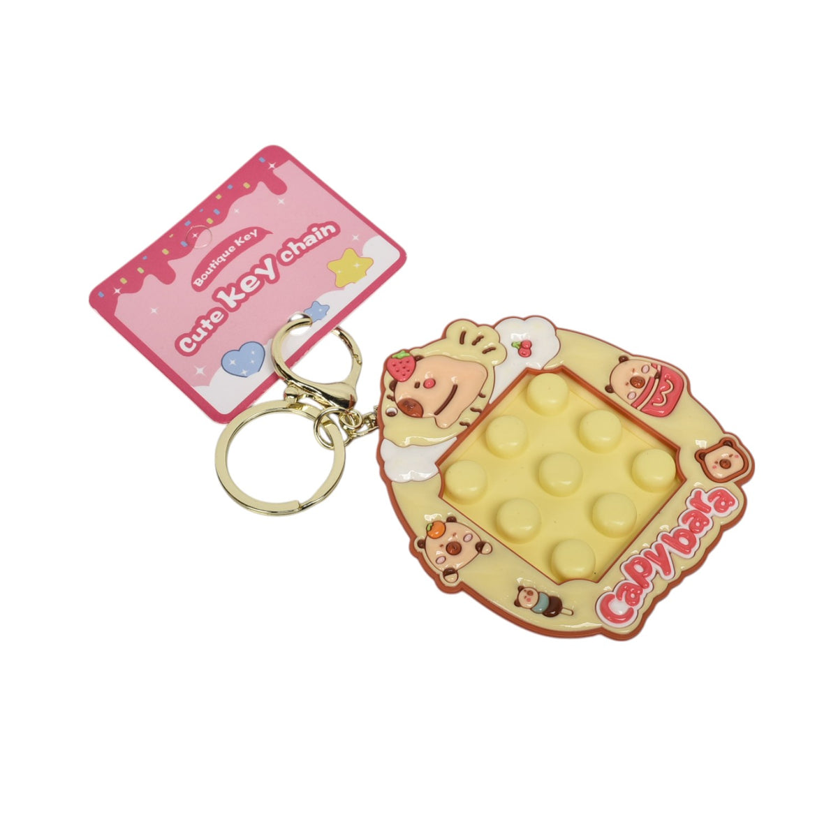 llavero plastico forma de juego amarillo dim:7x8x1