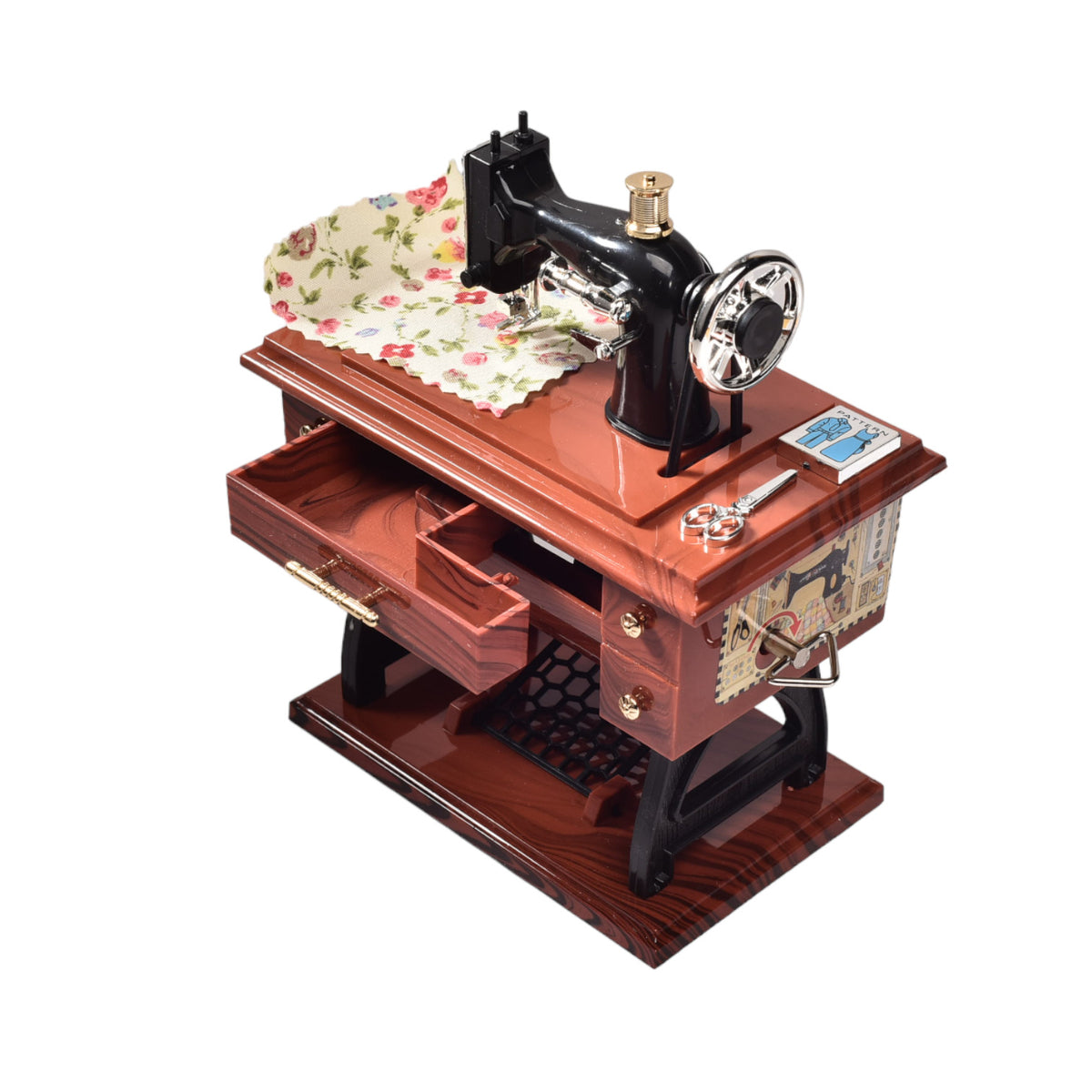 caja musical maquina de coser en plastico dim:16x12x7cm