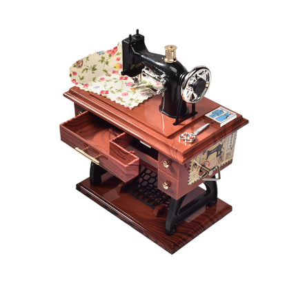 CAJA MUSICAL MAQUINA DE COSER EN PLASTICO DIM:16x12x7CM