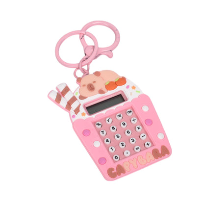 LLAVERO PLASTICO FORMA DE CALCULADORA AZUL ROSADO LILA DIM:5X7X1