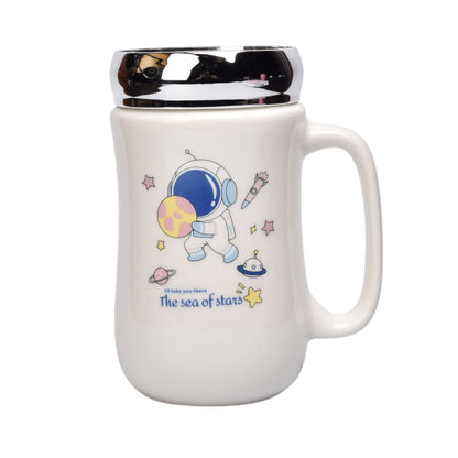 POCILLO CERAMICA DISEÑO ASTRONAUTA CON TAPA 450ML DIM:7X14